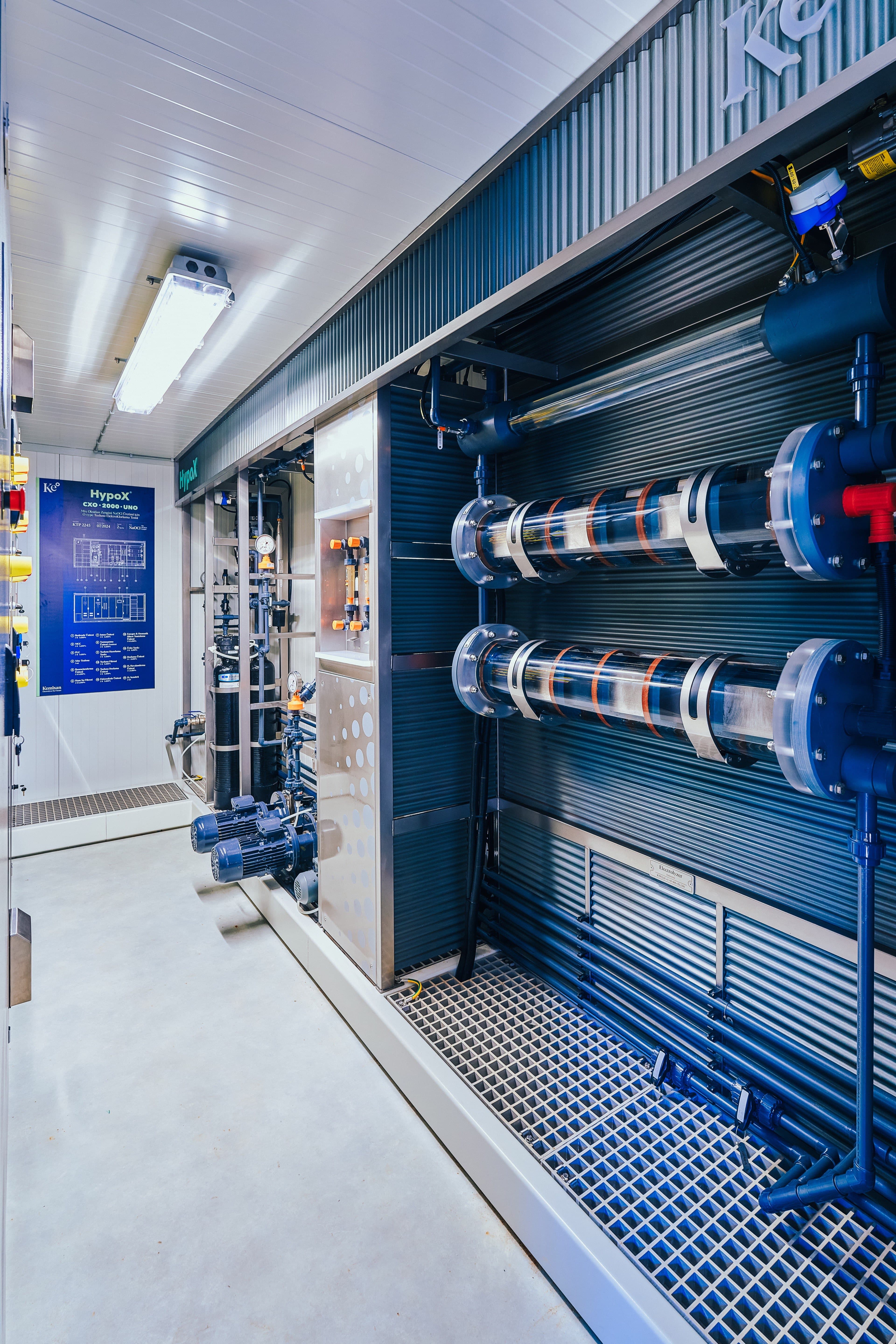 HypoX CX Series chlorination facility interior with electrolyzer cells and control panel