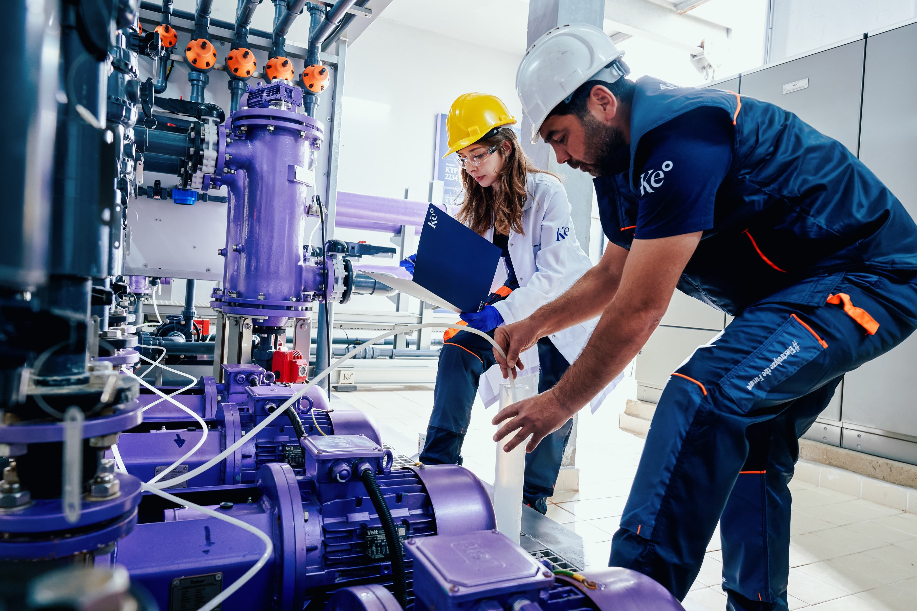 Kemisan engineers inspecting a Clorel® electrochlorination system