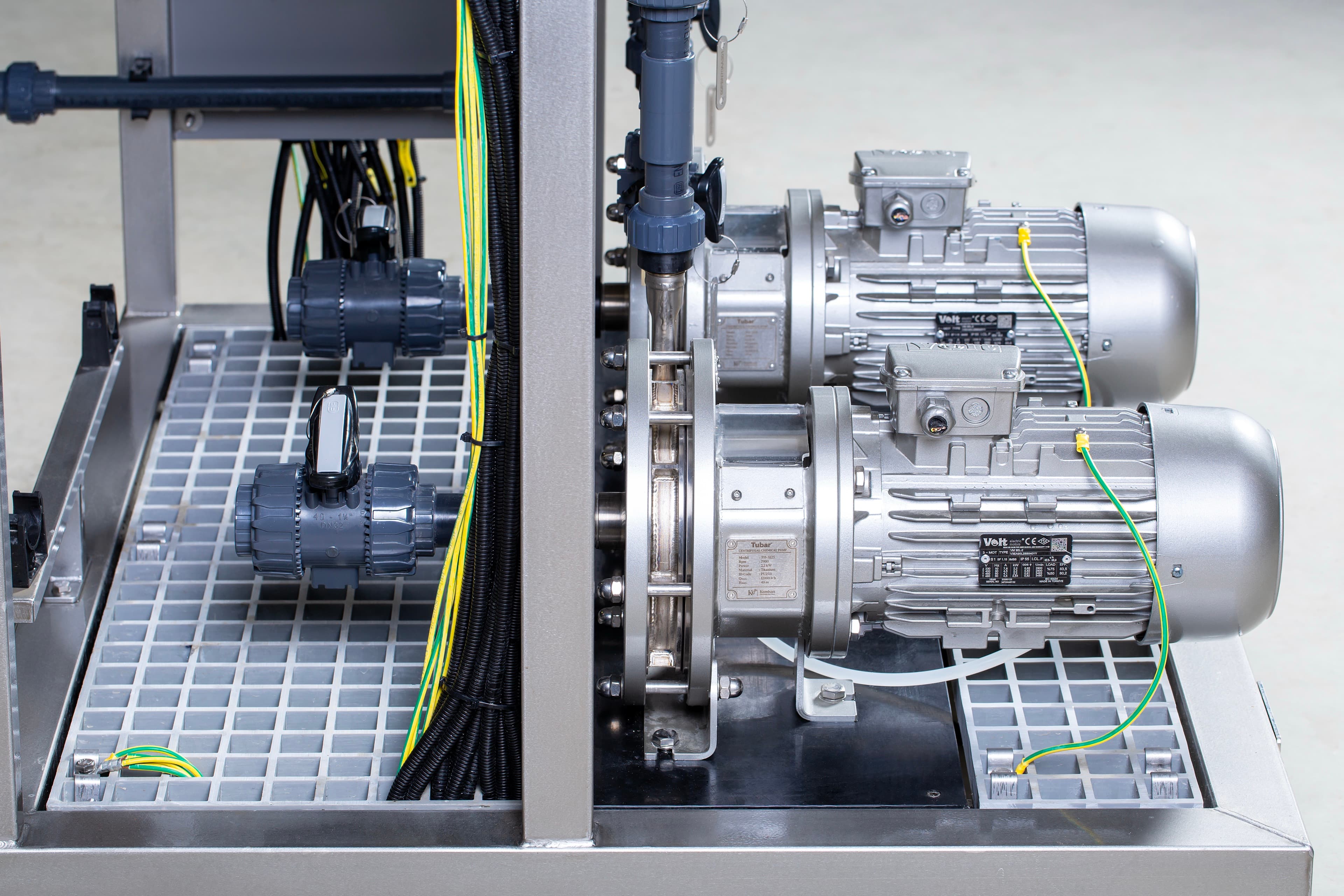 Close-up of a Kemisan Tubar titanium centrifugal pump installed on a HypoX PX dosing line